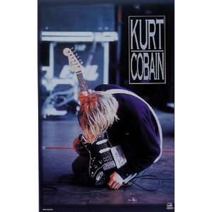 105317379_kurt-cobain-nirvana-guitar-poster-22-x-34-8120-amazoncom.jpg
