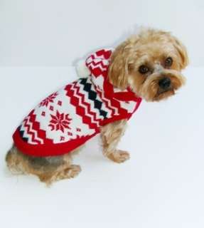 To properly fit your dog for a sweater, measure from the base of the 
