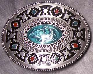   detailed pewter belt buckle featuring a southwest indian design