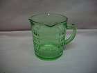 green glass measuring cup  