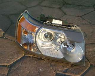 2008   2009 Land Rover LR2 Right Headlight, Xenon, Used, 3 broken tabs 