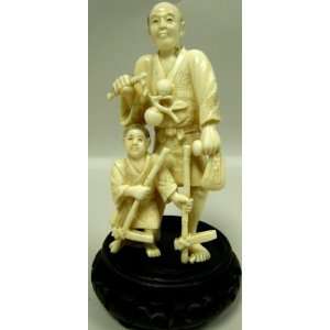 com Ivory Figural Group, Farmer Holding Branch with Two peaches. Son 