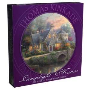  Thomas Kinkade 750 piece Round Puzzle Lamplight Manor 